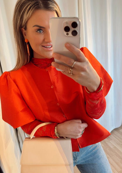 Julie top Oranje pofmouwen